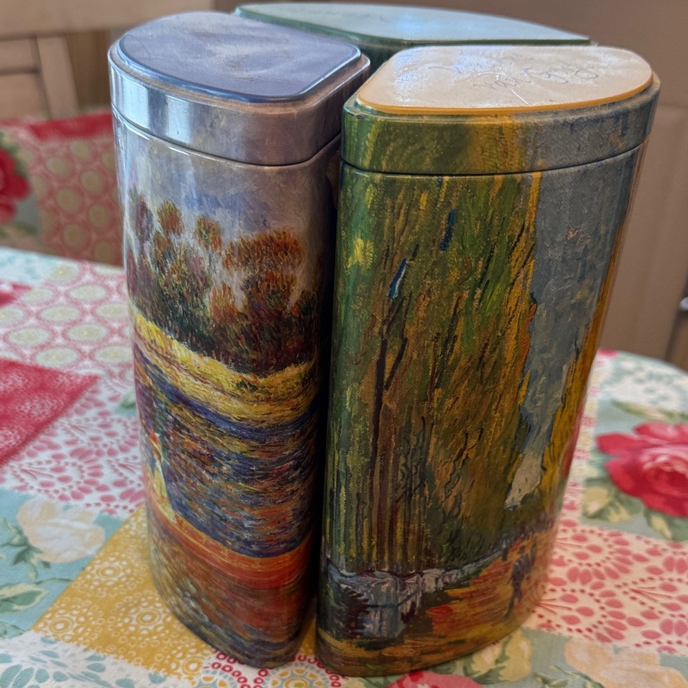 Three piece tin set van Gogh Monet and Renoir